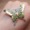 Butterfly emerald brooch