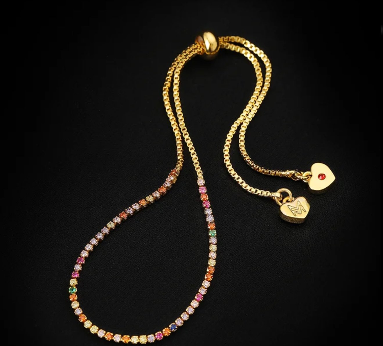 Simple colored zircon bracelet with a heart-shaped pendant that can be pulled out